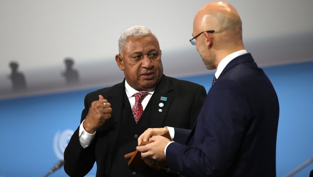 Frank Bainimarama and Michał Kurtyka