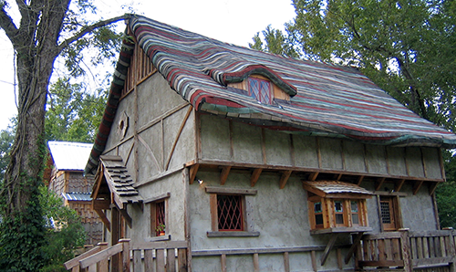 Dan Phillips builds entire houses from recycled materials for single mothers and low income families